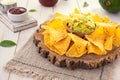 Traditional corn chip nachos with guacamole