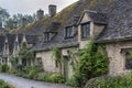 Traditional cotswold stone cottages built of distinctive yellow limestone in the famous Arlington Row, Bibury Gloucestershire UK Royalty Free Stock Photo