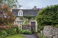 Traditional cotswold stone cottages built of distinctive yellow limestone in the famous Arlington Row, Bibury Gloucestershire UK Royalty Free Stock Photo