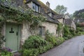 Traditional cotswold stone cottages built of distinctive yellow limestone in the famous Arlington Row, Bibury Gloucestershire UK Royalty Free Stock Photo