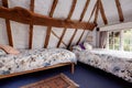 Traditional cottage attic bedroom Royalty Free Stock Photo