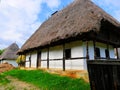 Traditional country house with straw roof, well preserved Royalty Free Stock Photo