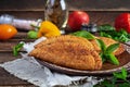 Traditional Crimean Tatar cuisine, chebureki with chicken meat. Fried empanadas on wooden background