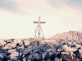 Traditional cross at mountain top in Alp. Cross monument to the dead climbers