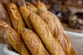 Traditional Crusty French Bread Baguette In Basket At Bakery. Fresh Organic Pastry At Local Market. France Cuisine Background