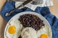 Traditional Cuban cuisine, black beans, rice and fried eggs Royalty Free Stock Photo