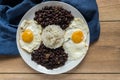 Traditional Cuban cuisine, black beans, rice and fried eggs Royalty Free Stock Photo