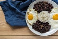 Traditional Cuban cuisine, black beans, rice and fried eggs Royalty Free Stock Photo