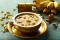 Traditional cuisines - Semiya payasam served in brass bowl