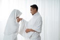 Shake hand wife kiss husband`s hand after praying