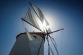 Traditional cycladic windmill against a deep blue sky in a beautiful summer day on Paros island, Cyclades, Greece Royalty Free Stock Photo