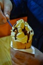 Traditional czech Trdelnik with chocolate and ice cream in Prague shop Royalty Free Stock Photo