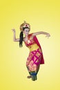 Traditional dancer dances with graceful gesture