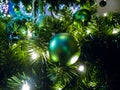 Traditional decorated Christmas tree in green colors with green