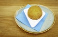 Traditional delicious Sicilian specialty arancino on a rustic ceramic dish