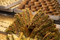 Traditional delicious turkish dessert baklava in the shop window showcase. Different kinds of turkish delights. Popular