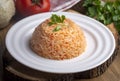 Traditional delicious Turkish food rice pilaf with tomatoes (Turkish name Domatesli pirinc pilavi