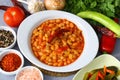 Traditional delicious Turkish foods Dried bean (Kuru fasulye). Hot turkish bean stew with a tasty tomato sauce Royalty Free Stock Photo