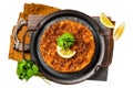 Traditional delicious Turkish foods lahmacun with mince lamb meat in steel tray. Isolated, white background. Royalty Free Stock Photo