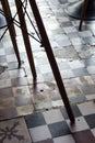 Traditional design old rustic floor tiles detail in spanish cafe