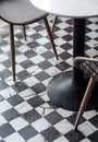 Traditional design old rustic floor tiles detail in spanish cafe