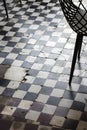 Traditional design old rustic floor tiles detail in spanish cafe