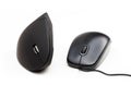 Traditional desktop PC mouse and an ergonomic wireless computer mouse, side by side comparison, isolated on white. Wrist pain