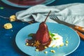 Traditional dessert pears stewed in red wine with chocolate sauce Royalty Free Stock Photo
