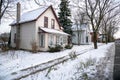 Traditional Detached Houses Covered in Snow in Winter Royalty Free Stock Photo