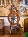 Traditional devices. Old fashioned wooden distaff, spindle, spinning wheel Royalty Free Stock Photo