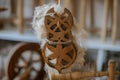 Traditional devices, vintage tailoring equipment concept. Old fashioned wooden distaff, spindle, spinning wheel Royalty Free Stock Photo