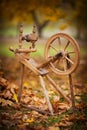 Traditional devices, vintage tailoring equipment concept. Old fashioned wooden distaff, spindle, spinning wheel. Old fashioned Royalty Free Stock Photo