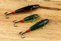 Traditional Devon Minnow Fishing Lures on Wooden Background
