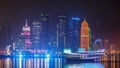 Traditional dhow boat in Doha at night timelapse, with modern buildings in the background. Royalty Free Stock Photo