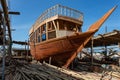 Traditional dhow under construction in wharf in Sur, Oman Royalty Free Stock Photo