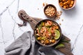 Traditional dish of asian cuisine is pad thai. Udon noodles with shrimps and fried tofu Royalty Free Stock Photo