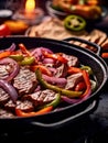 Traditional Dish of Mexico Steak Fajitas on a Plate on Selective Focus Background