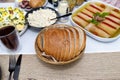 Traditional dishes from Poland for Easter breakfast, visible bread in the basket.
