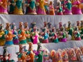 Indian market, Colorful clay dolls lined up for sale-India