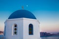 Traditional dome of the churches at Oia City and the moon in Santorini Island Royalty Free Stock Photo