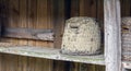 A traditional domed shaped woven bee hive