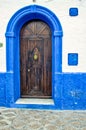 Traditional door on an old street inside Medina of Asilah , Morocco
