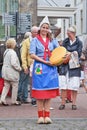 Traditional dressed girl on cheese market, Gouda, Netherlands