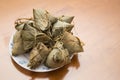 Traditional Duanwu Chinese rice dumplings stacked on plate