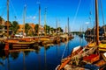 Traditional Dutch Botter Fishing Boats in the Harbor of the historic village of Spakenburg-Bunschoten Royalty Free Stock Photo