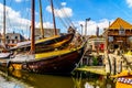 Traditional Dutch Botter Fishing Boats in the Harbor of the historic village of Spakenburg-Bunschoten Royalty Free Stock Photo