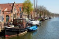 Traditional Dutch Botter Fishing Boats in the small Harbor of the Historic Fishing Village in Netherlands. Royalty Free Stock Photo