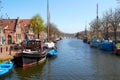 Traditional Dutch Botter Fishing Boats in the small Harbor of the Historic Fishing Village in Netherlands. Royalty Free Stock Photo