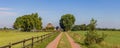 Traditional Dutch farm with trees Royalty Free Stock Photo