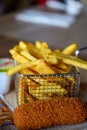 Traditional Dutch fast food snacks, fricandel and french fried potato chips
